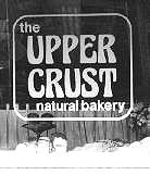 Upper Crust window with logo